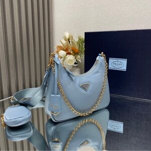 Prada Sky Blue Shoulder Bag with Gold Accents